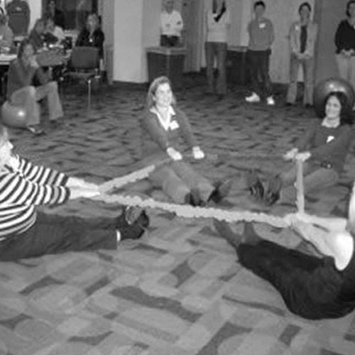 Black and white image of a team building game.